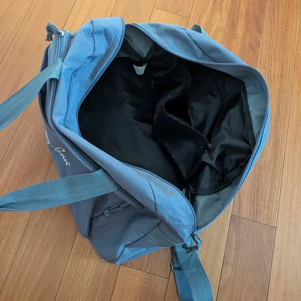 USED medium size duffle bag w/Ray Ban embroidered logo & never hide screen print